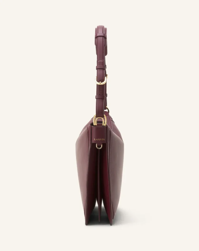 Asymmetrische Tasche „Compagnon” aus Leder Asymmetrische Tasche „Compagnon” aus Leder