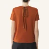 Baumwoll-T-Shirt mit Schleifendetail Baumwoll-T-Shirt mit Schleifendetail