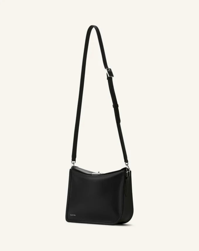 Compagnon Asymmetrische Leder-Clutch