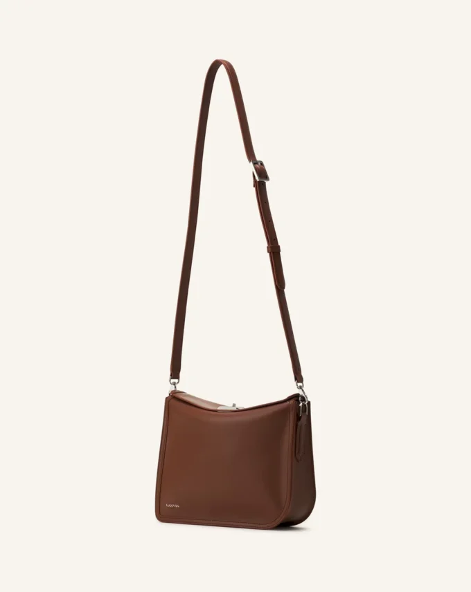 Compagnon Asymmetrische Leder-Clutch