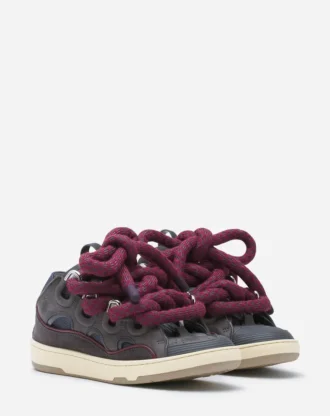 Curb Sneakers aus Leder mit Schlangenleder-Schnürsenkeln