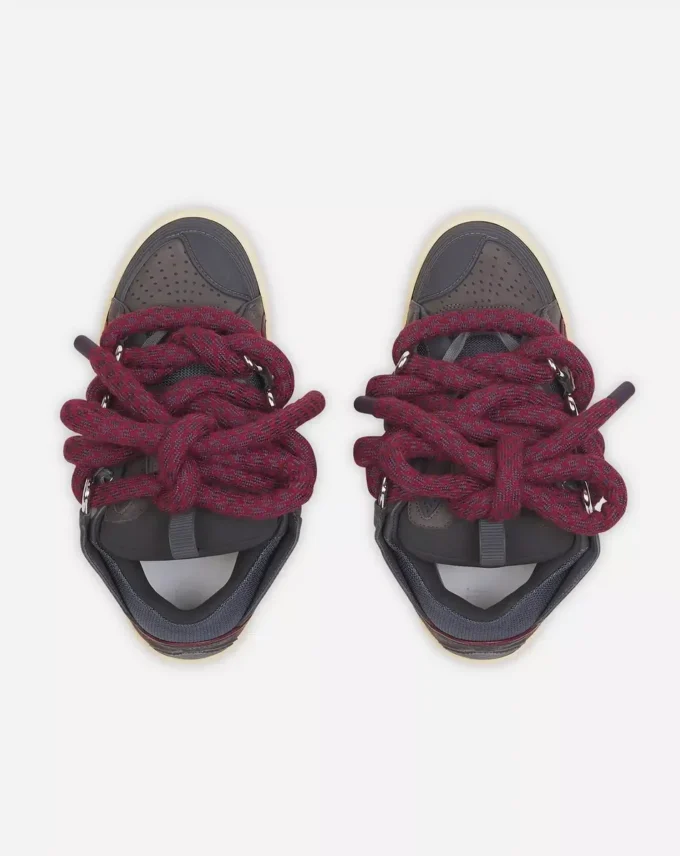 Curb Sneakers aus Leder mit Schlangenleder-Schnürsenkeln