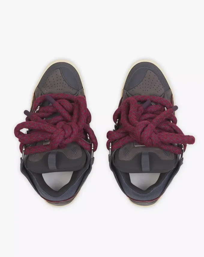 Curb Sneakers aus Leder mit Schlangenleder-Schnürsenkeln Curb Sneakers aus Leder mit Schlangenleder-Schnürsenkeln