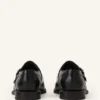 Monk-Schuhe aus glänzendem Leder Monk-Schuhe aus glänzendem Leder