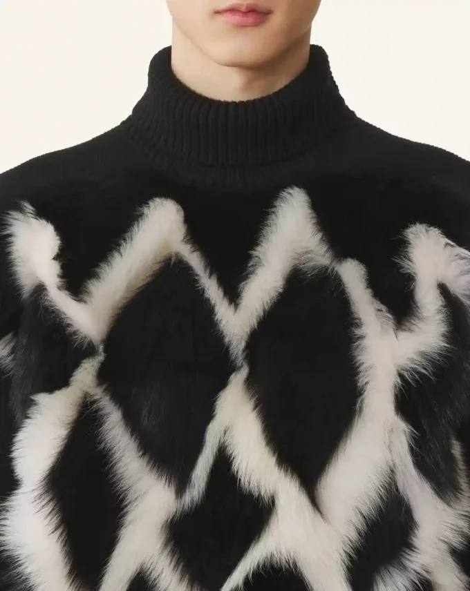 Rollkragenpullover aus Wolle und Leder mit Intarsien